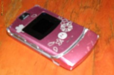 motorola cu clapa , roz cu floricele foto