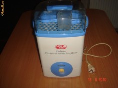 Sterilizator 8 biberoane Primii Pasi foto