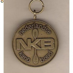 CIA 82 Medalie CAIAC CANOE -NKB NEDERLANDSE KANO BOND -dimensiuni aproximativ 34X42 milimetri