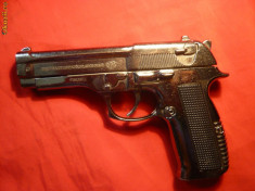 BRICHETA PISTOL METALICA foto