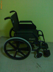 Carucior pentru persoanele cu dezabilitati foto