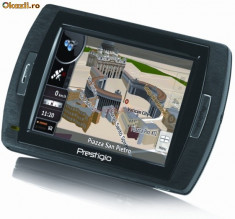 Gps Prestigio GeoVision 150.toate hartile+toate accesorile.in cutie nefolosit decat o data incarcat ca sa vad cum e foto