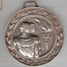 CIA 282 Medalie Olimpica- UNIUNEA TINERETULUI COMUNIST VARIANTA BULGAREASCA -GHIRGHI DIMITROV -dimensiuni circa 60X65 milimetri -starea care se vede