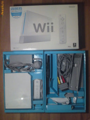 Consola Nintendo WII - vand impreuna cu 2 jocuri originale - &amp;quot;Wii active more Workouts&amp;quot; si &amp;quot;Wii Sports&amp;quot; foto