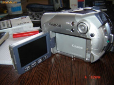 vand Camera video DVD Canon DC- 95, cu un design compact si foarte usor de folosit, cu zoom optic 25x, zoom digital 700x si procesor de imagine DIGIC foto