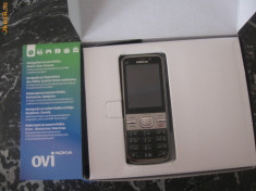 Nokia C5-00 cu accesorii foto