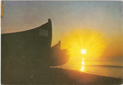 S12339 saturn rasarit de soare pe mare circulata foto