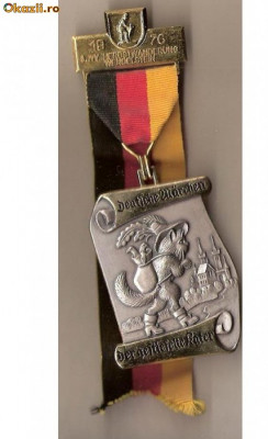 CIA 157 Medalie heraldica(Motanul Incaltat) - interesanta -(germana) foto