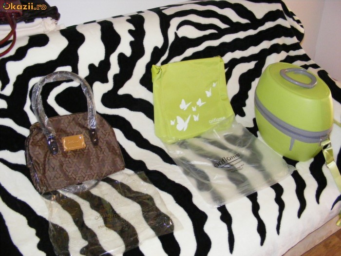 Genti Oriflame foto mare Genti Oriflame foto mare