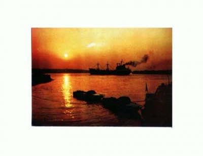CP135-54 Tulcea -Apus de soare in port -necirculata foto