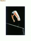 O FOTO 52 Gimnast chinez, evolutie la bara fixa -necirculata
