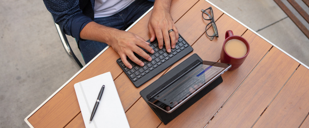 Man typing on a Flex Universal Keyboard