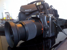 DSLR Sony Alpha 100 cu obiectiv Sony 18-70mm ca nou foto