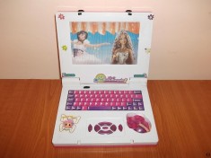 jucarie leptop de jucarie cu imagini miscatoare cu papusi barbie este muzical si lumineaza foto