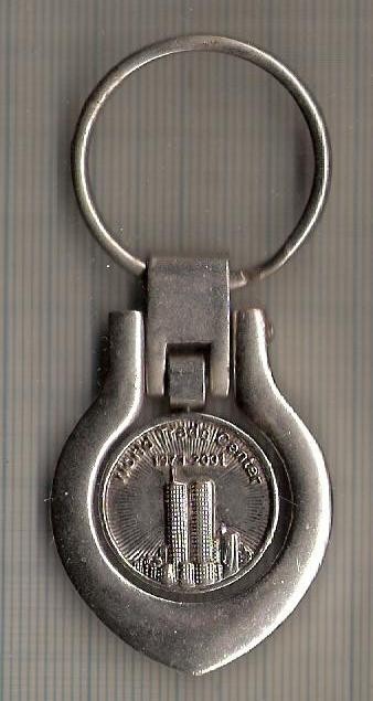 NEW 61 Breloc pentru colectionari -comemorativ -World Trade Center 1973-2001(turnurile gemene) -interesant -starea care se vede