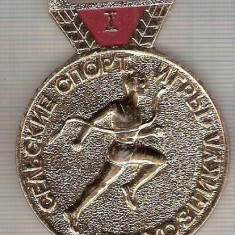 C184 Medalie sportiva -COLHOZNICUL-LOCUL I -U.R.S.S.? -marime circa 63X48 mm - aprox. 15 gr -starea care se vede