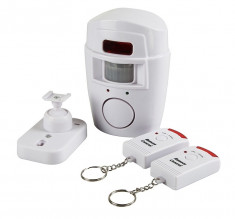 Alarma wireless cu senzor detector de miscare si 2 telecomenzi ideala pentru casa , garaj, magazin . sistem de alrma Oferta !!! foto