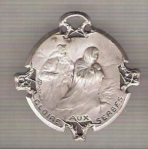 C248 Medalie (medalion) -de razboi -Glorie Serbiei 1916 (militar,mama cu copil)- executata de Franta-marime circa32X33mm-aprox.9gr-starea care se vede foto
