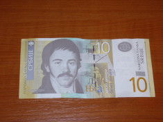 10 dinari sarbesti 2011 foto