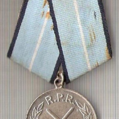 C321 Medalie(insigna) MERITUL MILITAR -R.P.R. -marime cca 85X44mm, greutatea aproximativ 24gr. -starea care se vede