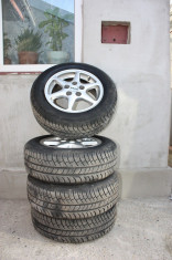 Vand 4 jante aliaj cu anvelope vara Michelin 195/65 R 14 pentru VW foto