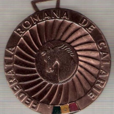 C74 Medalie Federatia Romana de Calarie -Camp.Rep.de Calarie, Finala 1987 -marime circa 59x65 mm -greutate aprox. 26 gr -starea care se vede