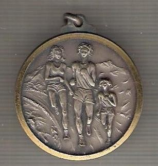 C124 Medalie sportiva -cros feminin -marime circa 32x36 mm -greutate aprox. 14 gr -starea care se vede foto