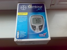 Vand glucometru Bayer Contour XT nou in cutie . foto