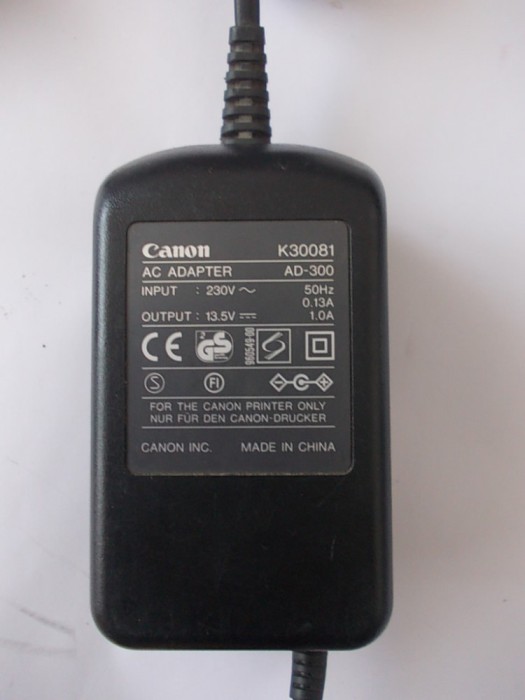 INCARCATOR CANON, 13,5 -1 A , MODEL AD - 300