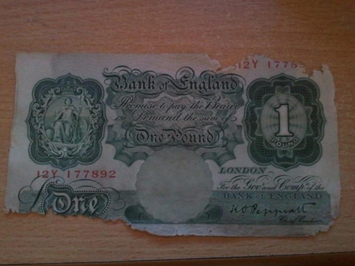 Anglia 1 lira sterlina 1928, 20 roni, ultra uzata, este cea din fotografie, lipsesc bucati din ea, necirculata tot pe okazii, aproape 500 roni