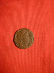 Moneda antica Romana ,bronz , d= 1,5 cm foto