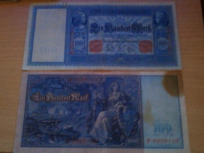 Germania 100 marci 1910, circulata, 30 roni, bancnota imperiala, putin arsa in coltul din dreapta sus.jpg