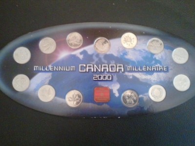 RoyalCanadianMintMilleniumCanadaMillenaireCardboardHolder 13 Coins 25 cents 2000 foto
