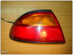 0955 - Lampa stop stanga spate Mazda 323 BA foto