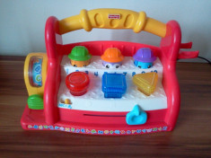 banc de lucru fisher price foto