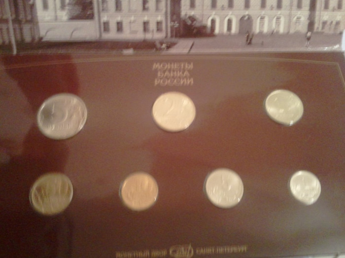 Lot 7 monede Rusia, anul 1997, 200 roni, taxele postale zero roni, sunt doua fotografii de prezentare: lot 7 monede + certificat de originalitate