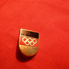 Insigna veche Olimpica RFG, h= 1,6 cm,cu inscriptia fabricantului pe spate,metal