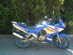 Vand sau schimb motocicleta Racer 125 cm,an 2006 foto