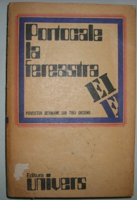 Portocale la fereastra ei foto