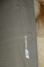 Pantaloni trening Reebok; 84 - 118 cm talie elastica, 99 cm lungime, 67 cm crac interior; 100% poliester; impecabili foto