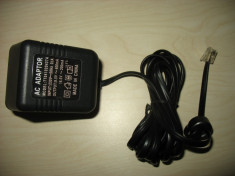 Alimentator cu 2 tensiuni de iesire: 9.5V - 400mA si 16.5V - 200mA foto