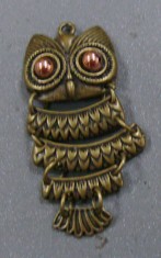 Pandantiv/martisor/cercei bufnita de bronz din elemente mobile foto
