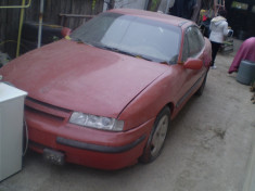 Dezmembrez Opel calibra motor 2000 sfi foto