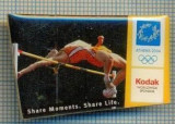 107 INSIGNA -OLIMPICA, ATENA 2004 -KODAK sponsor olimpic -proba de saritura in inaltime -starea care se vede
