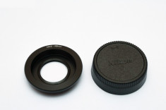 Adaptor Obiective M42 la DSLR Nikon cu lentila pentru focus la infinit, +capac foto