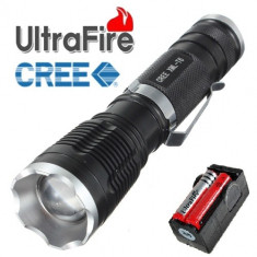 Lanterna LED UltraFire 1300 Lumeni CREE XML Led T6 zoom 5 moduri luminare incarcator dublu si 2 acumulatori ultrafire 18650 de 3800mAh foto