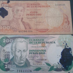 Lot 2 bancnote Columbia 100 pesos 1989 si 200 pesos 1989, au o pată de cerneală