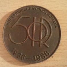 Medalie Intreprinderea Optica Romana 50 ani 1936-1986, 60 grame + taxele postale 10 roni = 70 roni