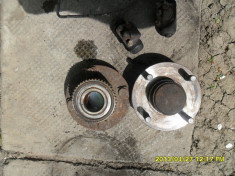 rulment roata spate SKF cu ABS + butuc roata si 4 prezoane - din dezmembrarea unui ford mondeo visiniu ghia an 1997 motor 2.0 16v cu 68000km parcursi foto