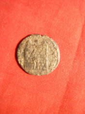 Moneda romana bronz , d= 1,7 cm ,cal.Buna foto